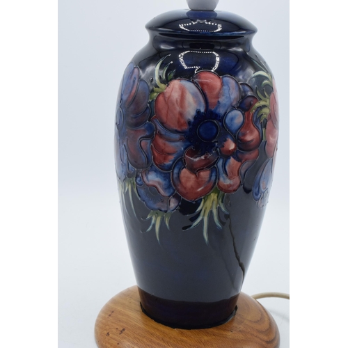 86 - Moorcroft pottery lampbase in the Clematis (or similar) floral pattern on turned wooden base, 28cm t... 