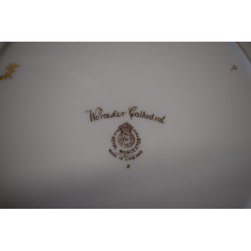 142 - Royal Worcester signed cabinet plates with shaped edges to include Worcester Cathedral, Canterbury C... 