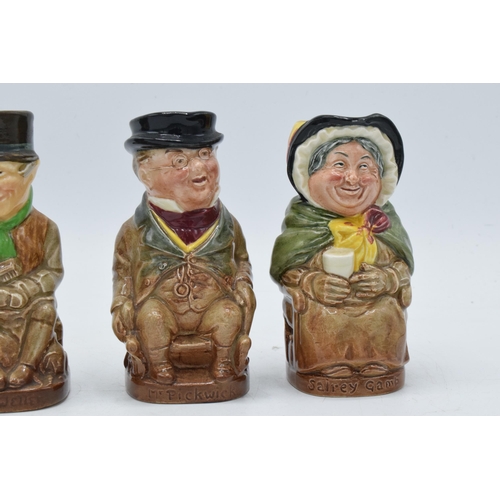 132 - 4 Royal Doulton Toby jugs from the Dickens collection to include Pickwick, Sam Weller, Micawber and ... 