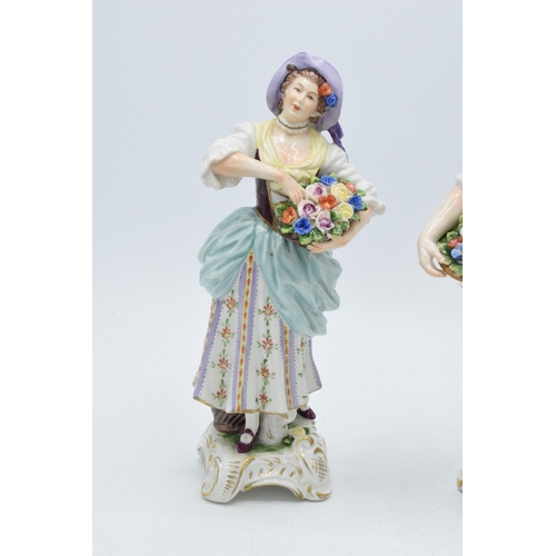 2 - A pair of Rudolf Kammer porcelain figures of flower carriers, height 23cm (2).