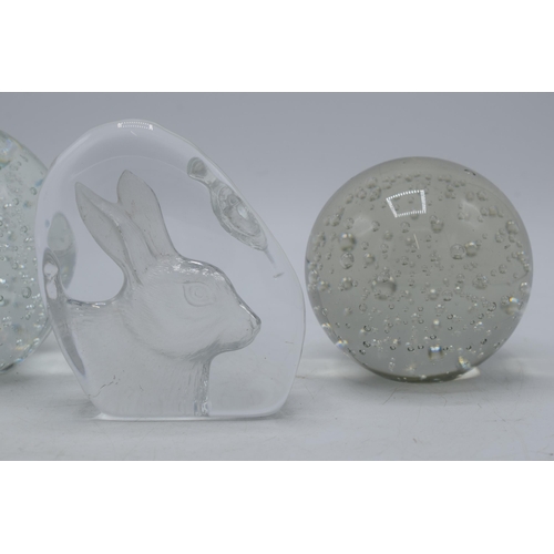 4 - A trio of glass paperweights to include a rabbit example and 2 bubble effect items (3).