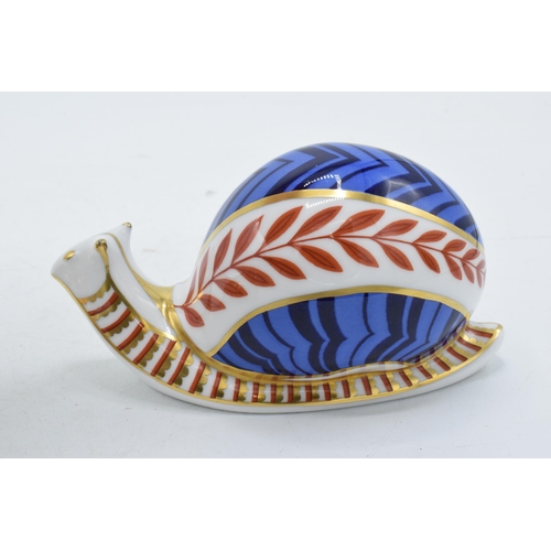 42 - Royal Crown Derby paperweight, Snail, decorated in the classic spiral design/shell pattern and leave... 