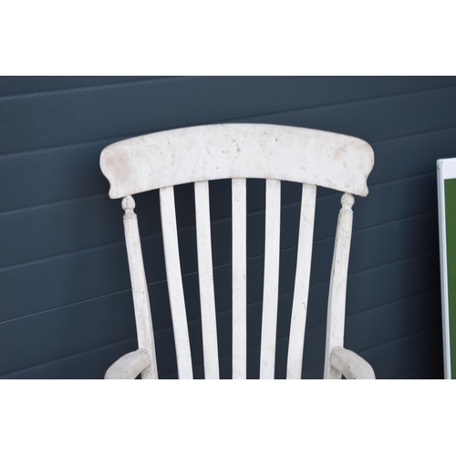 476 - 19th century painted high backed farmhouse armchair, 106cm tall.