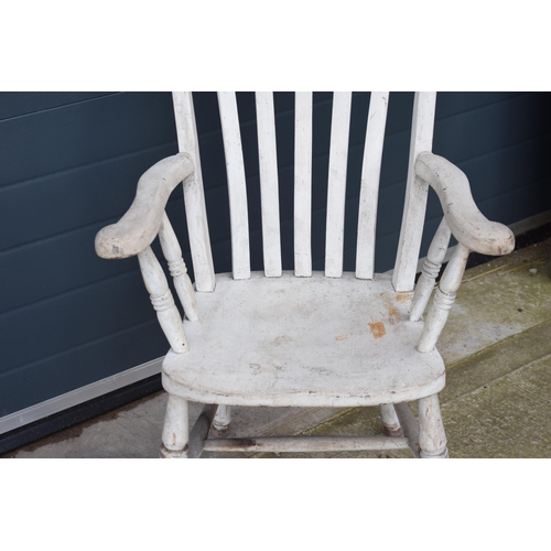 476 - 19th century painted high backed farmhouse armchair, 106cm tall.