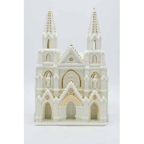 5 - Large pottery model of a cathedral in creamware, in the style of Crested China / Belleek, 25cm tall.