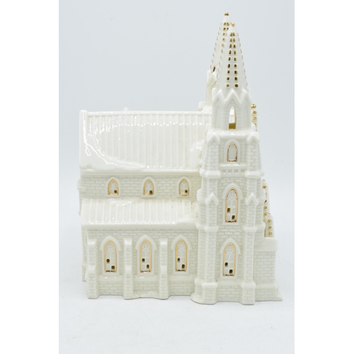 5 - Large pottery model of a cathedral in creamware, in the style of Crested China / Belleek, 25cm tall.