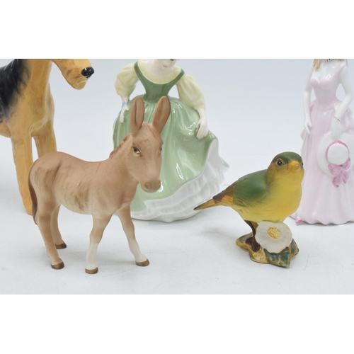 122 - Beswick to include a matte donkey foal, a matte Greenfinch and an Airedale Terrier together with Fai... 