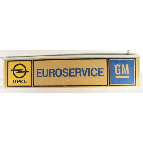 An original vintage double-sided Opel EUROSERVICE GM General Motors Lightbox salvaged from a car dealership. 102cm by 21cm.
