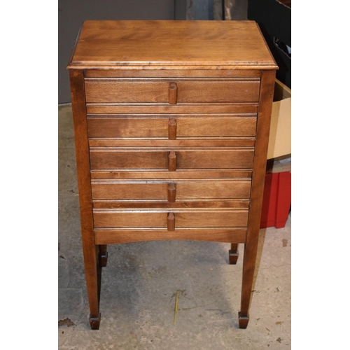 484 - Mid 20th century wooden music cabinet with pull out drawers and folding draw fronts with a box of sh... 