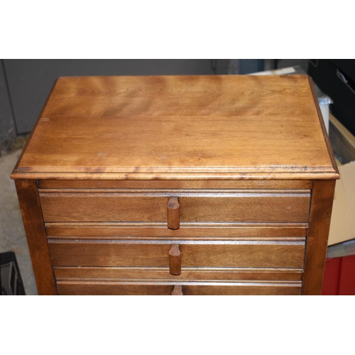 484 - Mid 20th century wooden music cabinet with pull out drawers and folding draw fronts with a box of sh... 