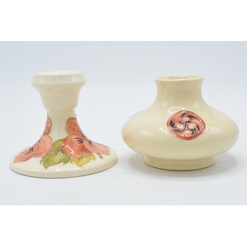 78 - Moorcroft squat vase decorated with a Florian vase (red dot) together with Hibiscus candlestick (2).