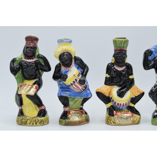 80 - A collection of Drioli novelty decanters to include African tribal figures (6 - all empty).