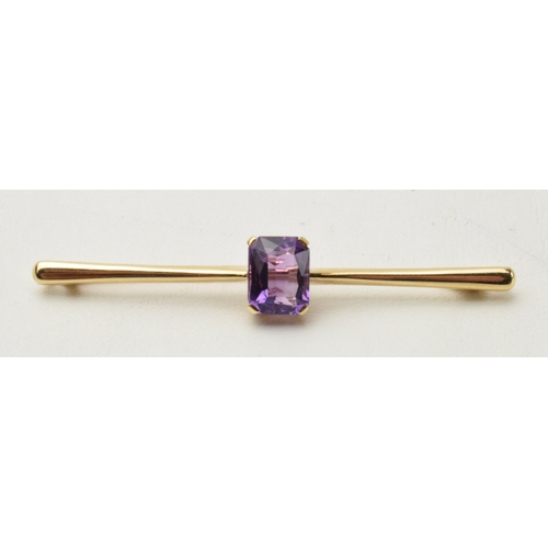 168A - 9ct gold amethyst bar brooch, 3.8 grams, 5.5cm wide.