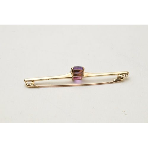 168A - 9ct gold amethyst bar brooch, 3.8 grams, 5.5cm wide.