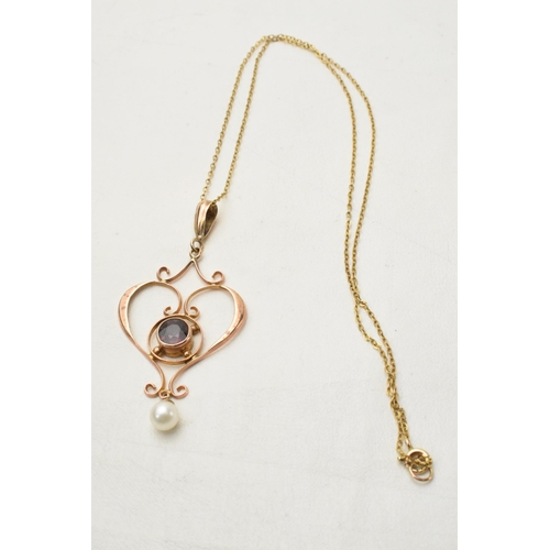 168F - 9ct rose gold garnet and pearl Art Nouveau pendant on 9ct gold chain, 3.2 grams.