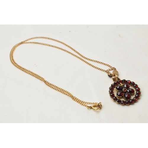 168G - 9ct gold chain with gilt metal garnet pendant, total weight 4.3 grams.