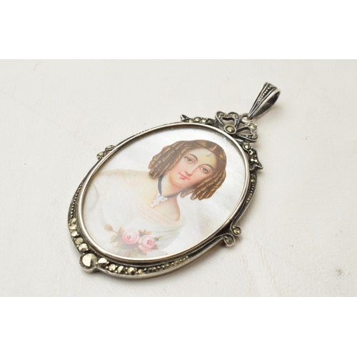 168I - Silver and marcasite mother of pearl miniature pendant with portrait of a lady, 6cm long.