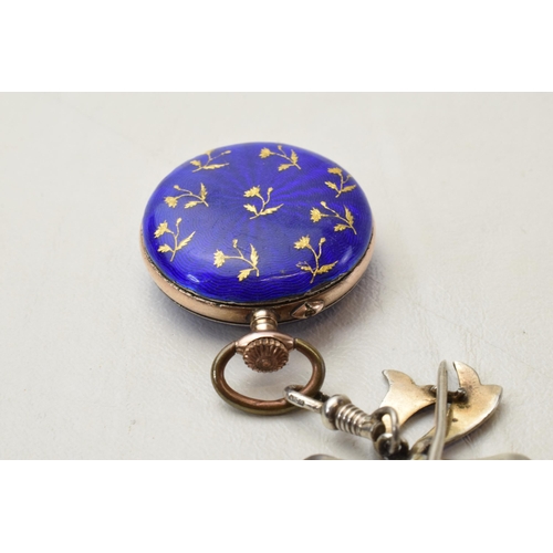 168L - Silver and blue enamel ladies fob watch with inlaid silver decoration with bow pin, in working order... 