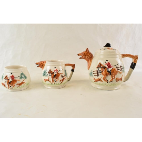 458 - A hunting themed tea pot and coffee set c1950s together with a rattan wrapped tea tray.