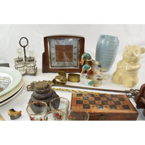 459 - A mixed collection of items to include vintage clock (working) ceramic item, wade whimsies and hunti... 