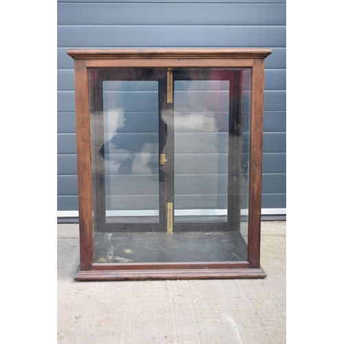 486 - Edwardian stained pine glass display cabinet with locking doors, with key, 81x60x95cm tall.