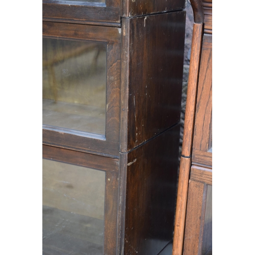 488 - Early 20th century three section barrister's bookcase with sliding doors with brass knobs, Globe Wer... 