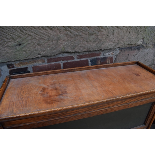 489 - Early 20th century golden oak two section barristers bookcase, Globe Wernicke company style, sliding... 