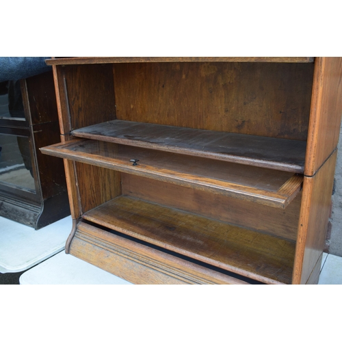 489 - Early 20th century golden oak two section barristers bookcase, Globe Wernicke company style, sliding... 