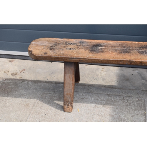 491 - Late 18th / early 19th century hardwood provincial pig bench with pegged splayed legs and 2 inch thi... 