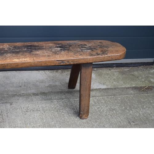 491 - Late 18th / early 19th century hardwood provincial pig bench with pegged splayed legs and 2 inch thi... 