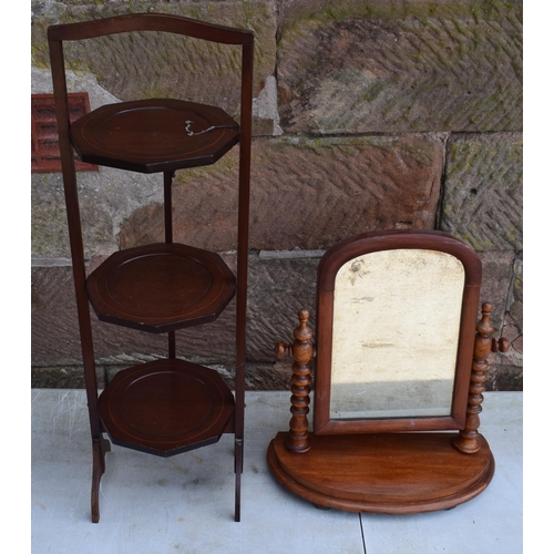 492 - A 3 tier folding plant stand together with a Victorian turned swinging loo mirror, 89cm tallest (2).