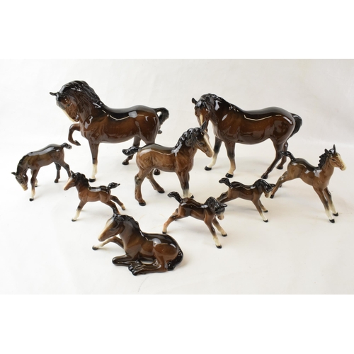 64 - A collection of Beswick brown horses. To include two standing large and seven fowls. (9)