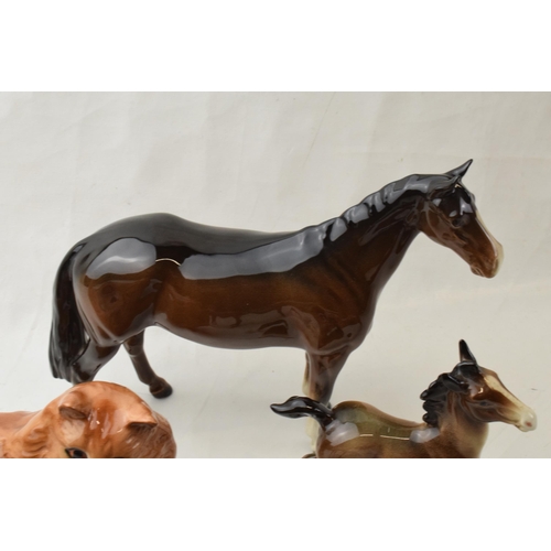 71 - Beswick to include a ginger cat, a brown thoroughbred facing right with 2 brown foals (4).