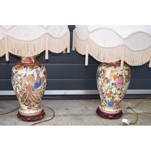 500 - A trio of modern oriental design ceramic lampbases with shades, 94cm tall inc fittings / shade (3).