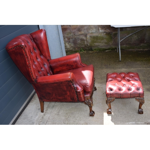 504 - Queen Anne revival chesterfield wingback armchair, in red leather with button back, raised on front ... 