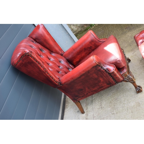 504 - Queen Anne revival chesterfield wingback armchair, in red leather with button back, raised on front ... 