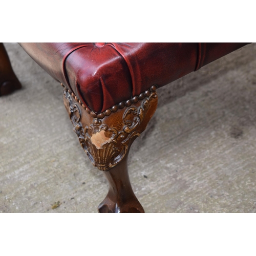 504 - Queen Anne revival chesterfield wingback armchair, in red leather with button back, raised on front ... 