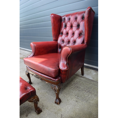 504 - Queen Anne revival chesterfield wingback armchair, in red leather with button back, raised on front ... 