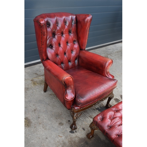 505 - Queen Anne revival chesterfield wingback armchair, in red leather with button back, raised on front ... 