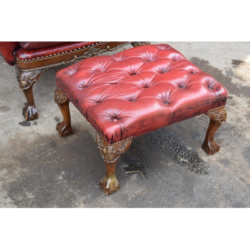 505 - Queen Anne revival chesterfield wingback armchair, in red leather with button back, raised on front ... 