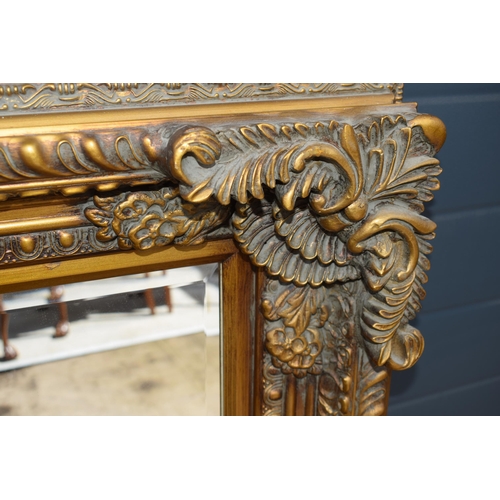 508 - Quality reproduction ornate gilt rectangular mirror with bevel edged glass, 120x89cm.