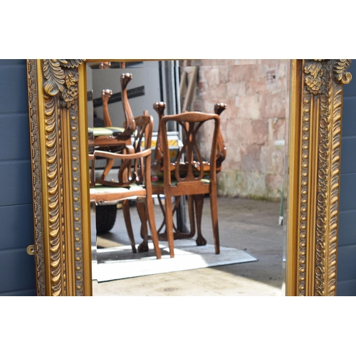 508 - Quality reproduction ornate gilt rectangular mirror with bevel edged glass, 120x89cm.