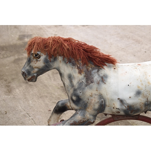 515 - Vintage childs rocking horse on metal frame, 115cm wide, possibly once a merry-go-round horse / part... 