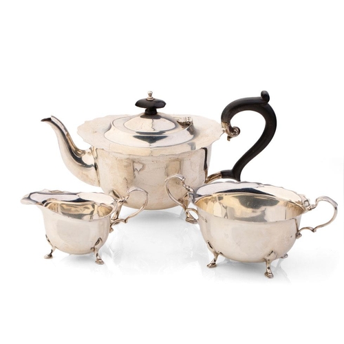 290 - Hallmarked silver tea set to include a teapot, milk and sugar with ebonised wooden handle and finial... 