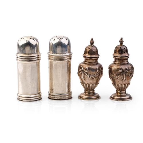 302 - Two pairs of silver cruet sets, one set with ornate decoration, the others of plainer form, 95.6 gra... 