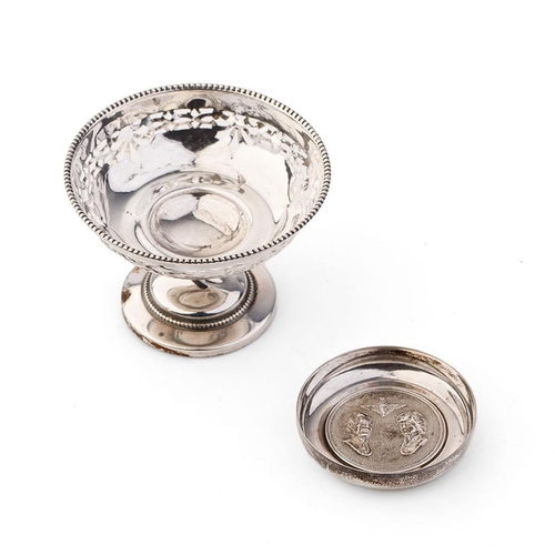 304 - A pair of silver items to include an ornate pedestal sweet dish, Birmingham 1922, loaded base, and a... 