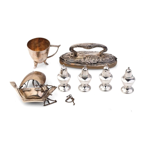 306 - A collection of silver items to include a nail buffer, a modernist style cup, a set of 4 loaded crue... 