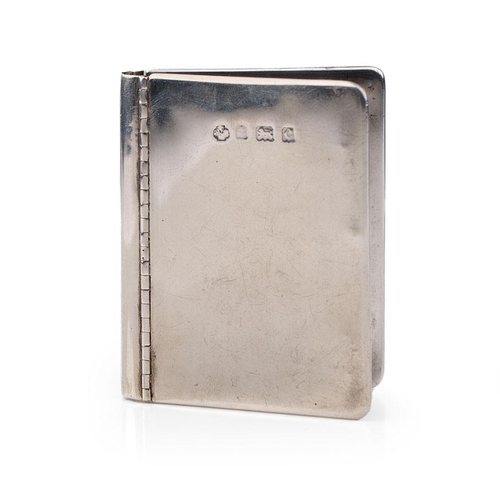 311 - Hallmarked silver novelty photo frame in the form of a book, 63 grams, Birmingham 1902, 6cm tall.