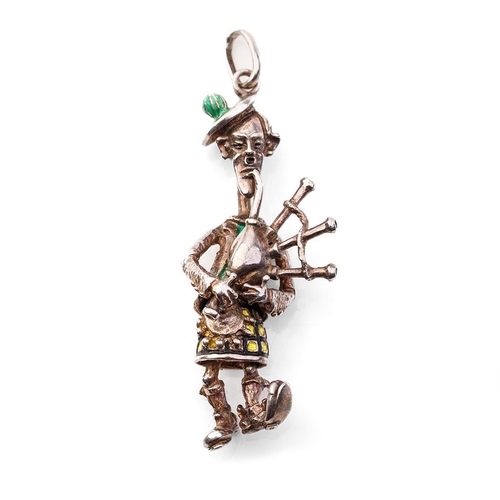 312 - Sterling silver figure / charm of a Scottish Bagpipe player with enamelled decoration, 31.0 grams, 7... 