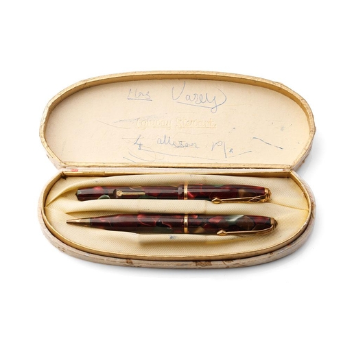 391 - Cased Conway Stewart fountain pen with 14ct gold nib and propelling pencil.